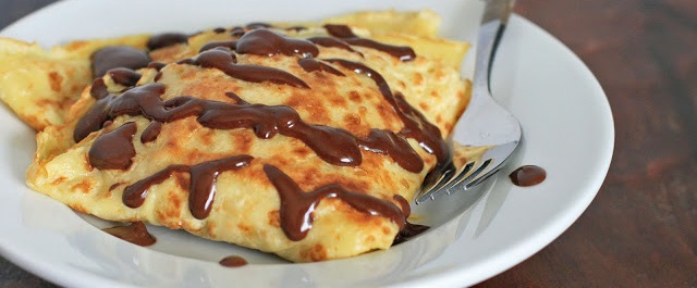 Pancakes à la Gundel- Thin Pancakes with Walnut Filling and Chocolate Rum Sauce